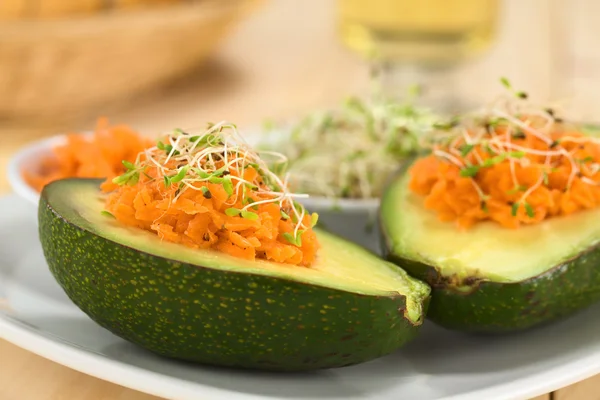 Avocado with Grated Carrot and Sprouts