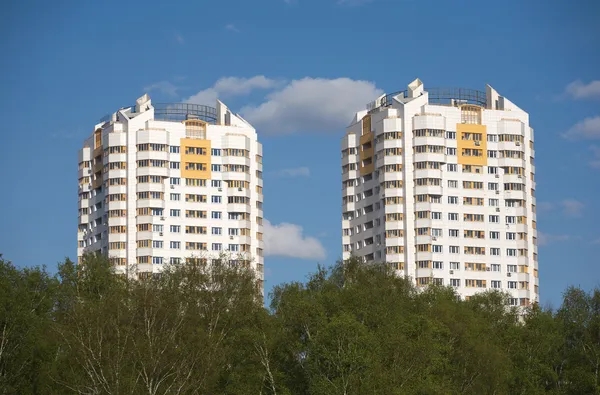 Two constructed multistory residential buildings in ecological place