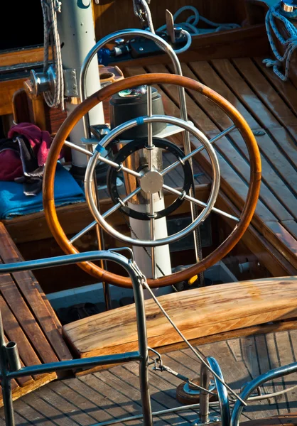 Steering wheel on yacht