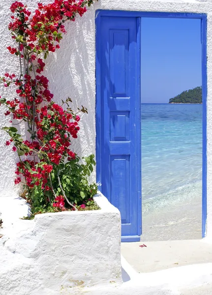Traditional greek door with a great view on Santorini island, Greece
