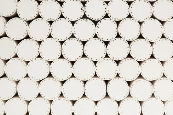 Abstract background of white filters of cigarettes