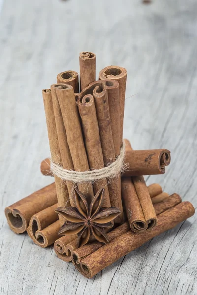 Cinnamon and star anise over wood