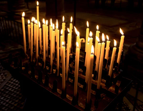 Church candle in a row