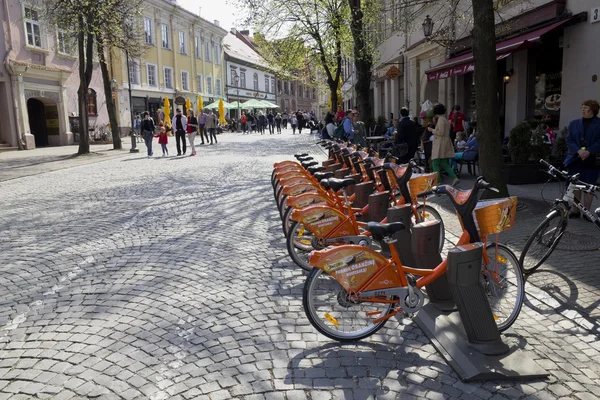 Orange self-service bikes