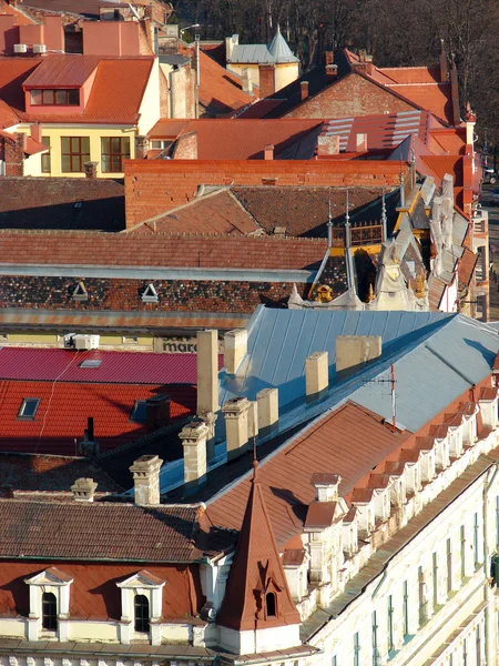 Urban scene across built up area showing roof tops