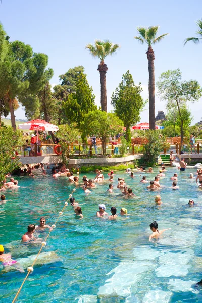 People swim in Cleopatra pools near Pamukkale, Turkey