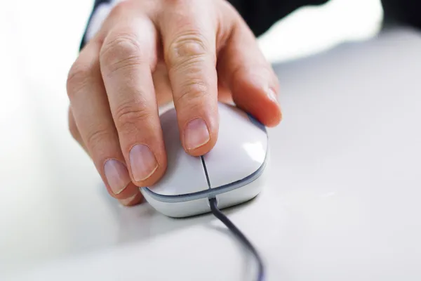 Close-up hand with computer mouse