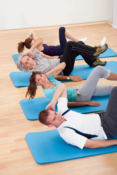 Group of exercising in a gym class