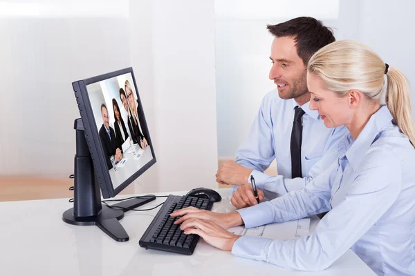 Couple watching an online presentation