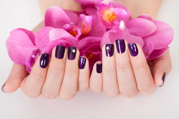 Woman with beautifully manicured nails