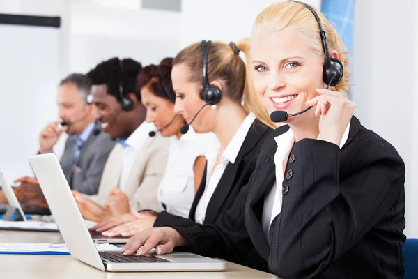 Beautiful Young Woman Talking On Headset