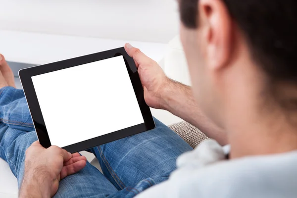 Man Holding Digital Tablet