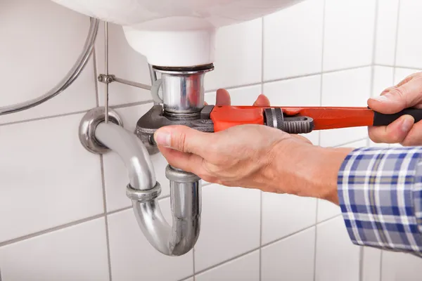 Plumber Fitting Sink Pipe