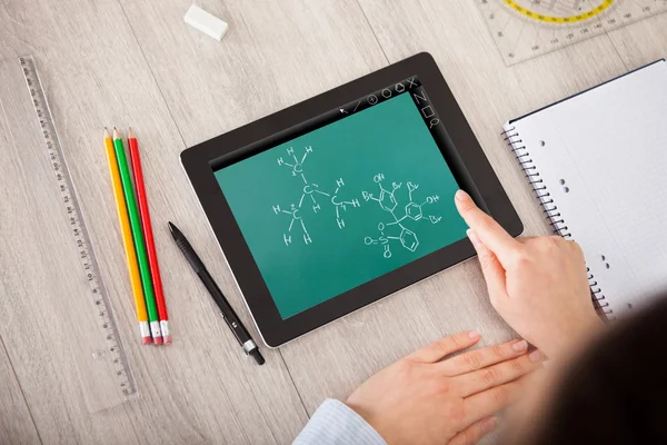 Hand Over Molecule Structure On Digital Tablet