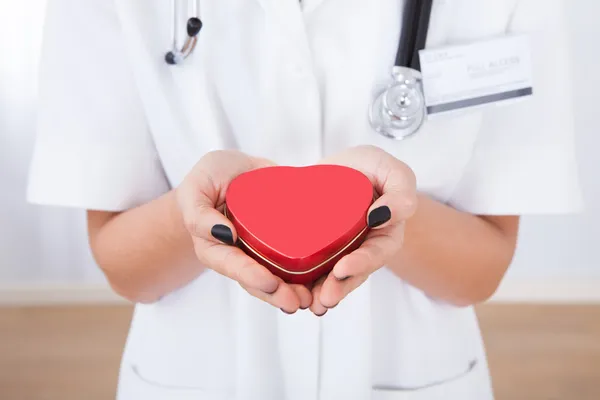 Doctor Holding Heart