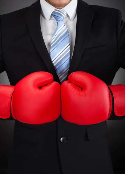 Businessman Wearing Boxing Gloves