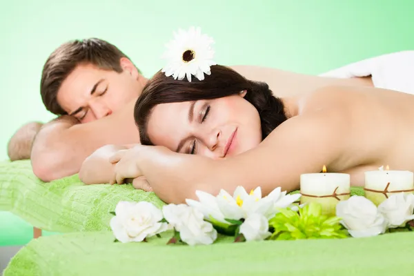 Couple Relaxing In Spa