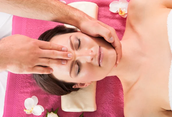 Woman Receiving Head Massage