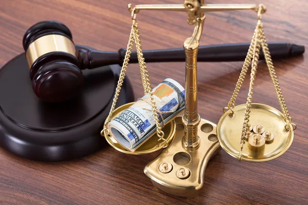 Gavel And Scales With Money