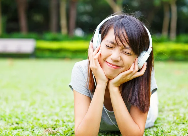 Asian young girl enjoy listen to music