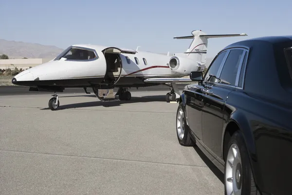 luxurious car and airplane