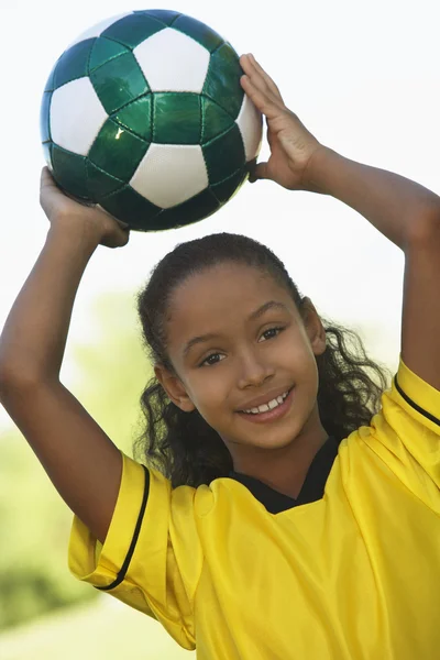 Girl Holding Soccer Ball