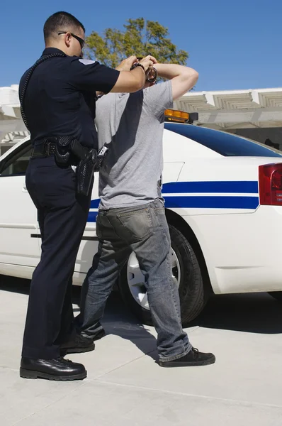 Officer Arresting Young Man