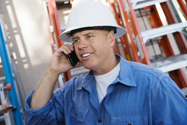 Industrial Worker Using Cell Phone