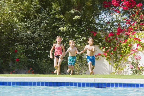Happy kids in swimming pool