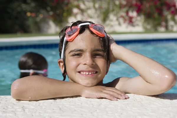 Boy At The Edge Of Swimming Pool