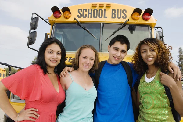 Teenagers By School Bus