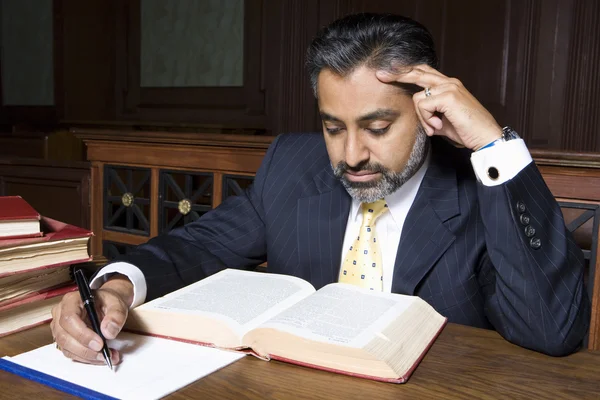 Lawyer Reading Law Book