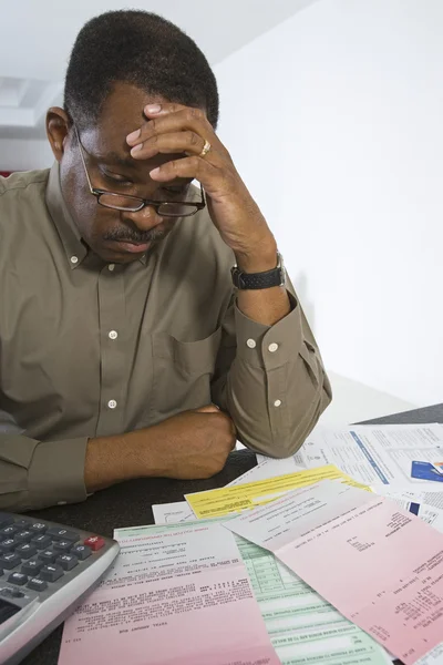 Man Worrying About Home Finances