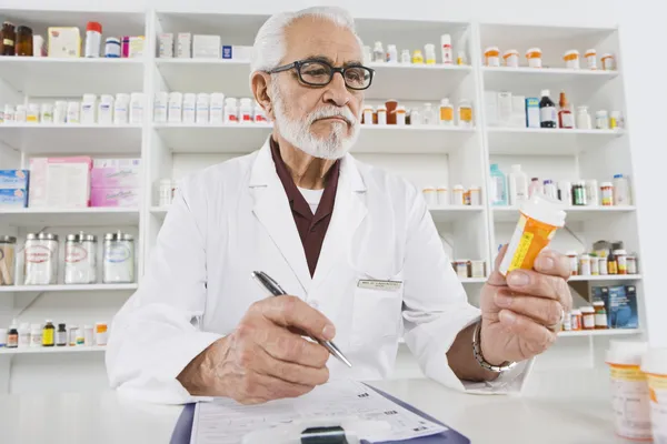 Pharmacist Working In Pharmacy