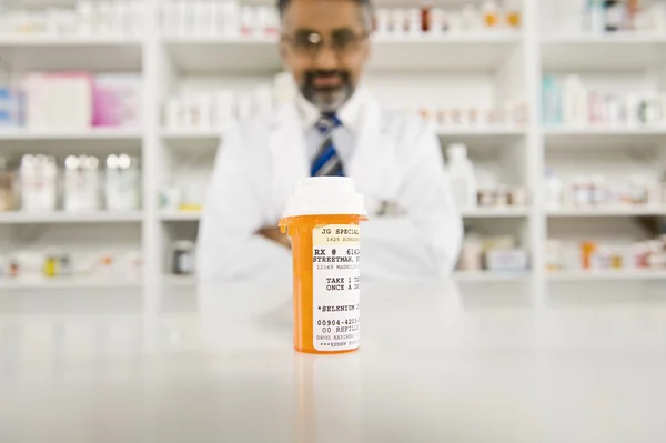 Prescription Drugs And Male Pharmacist