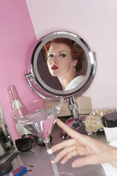 Beautiful woman with Reflection in mirror
