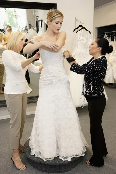 Mother and daughter in bridal boutique