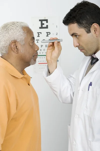 Doctor Testing Patient\'s Eye