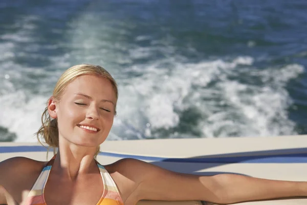 Woman Relaxing On Boat