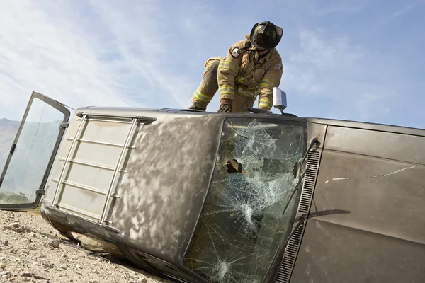 Firefighter Getting Into Crashed Car