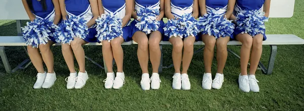 Low Section Of Cheerleaders With Pom-Pom