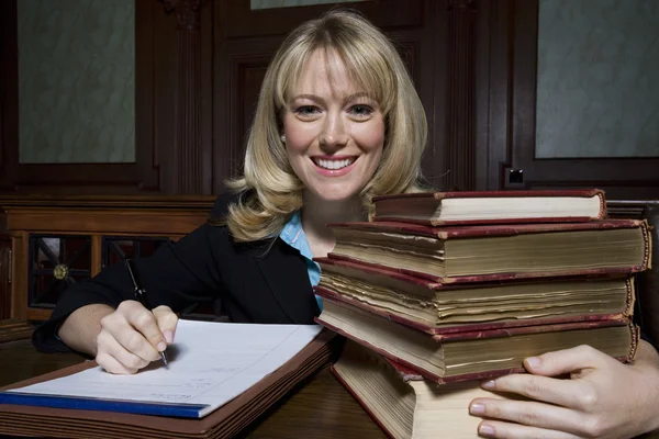 Female Advocate With Law Books