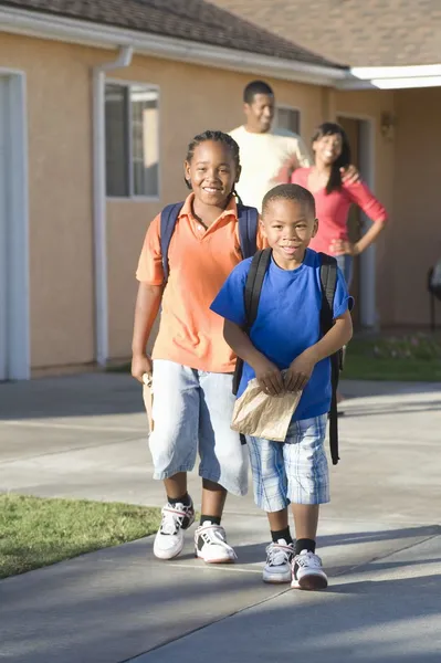 Parents Watching Children Leave House