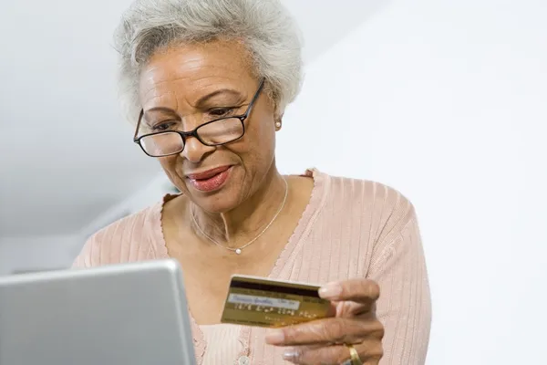 Senior Woman Shopping Online