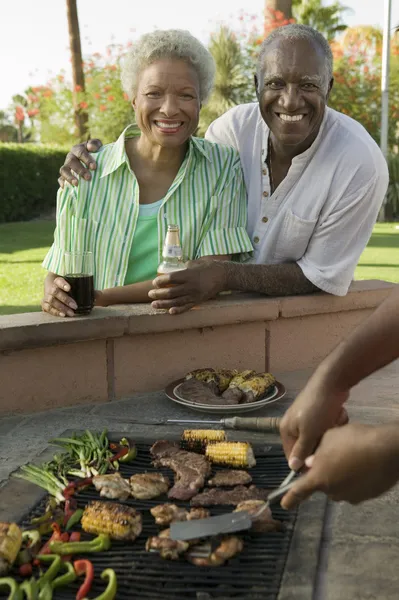 Senior Couple at Outdoor Barbecue