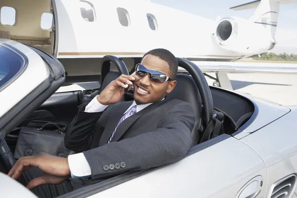 Businessman in convertible
