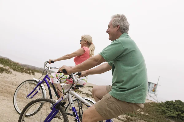 Couple riding bicycles