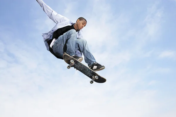 Man jumping on skateboard