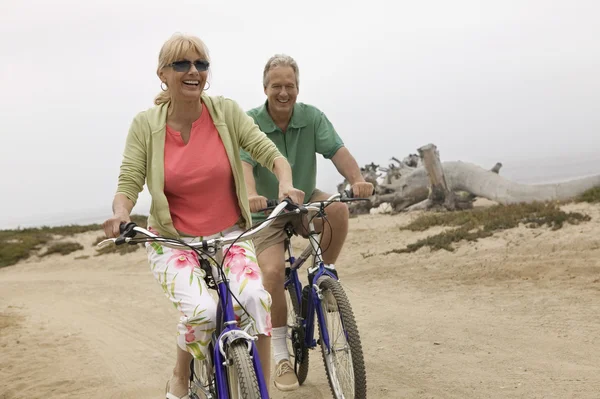 Couple riding bicycles