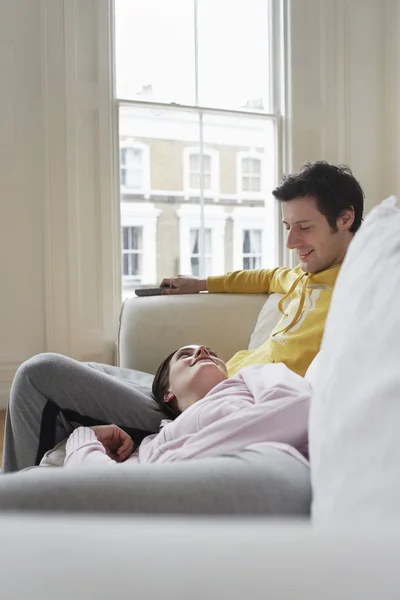 Relaxed couple on sofa